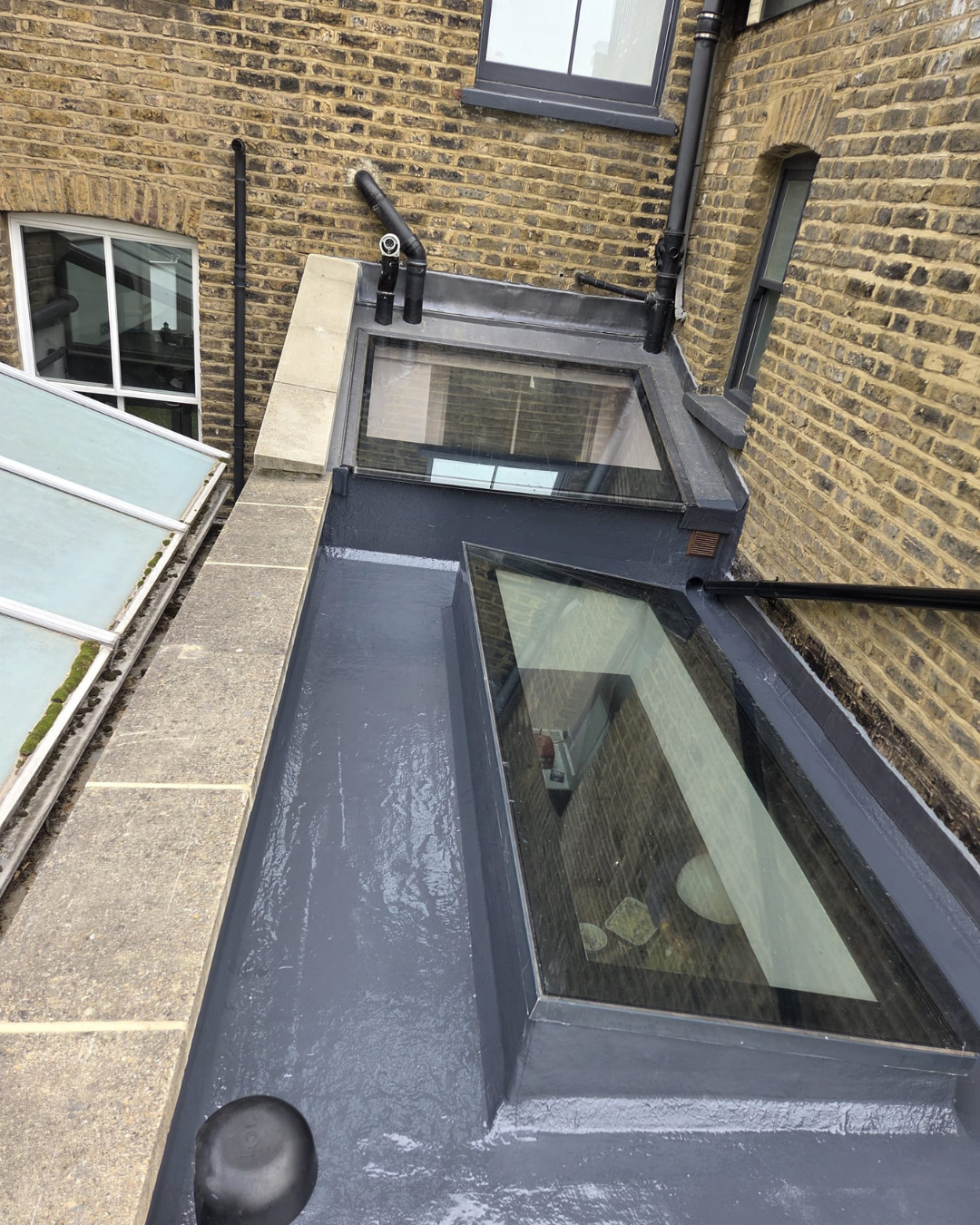 Polyurethane liquid membrane flat roof installation by BARL Roofing serving in Flat Roofing Islington N1