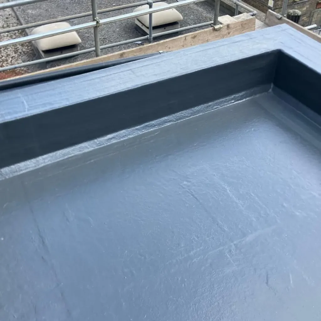 Flat roof replacement. Warm deck GRP fibreglass installation